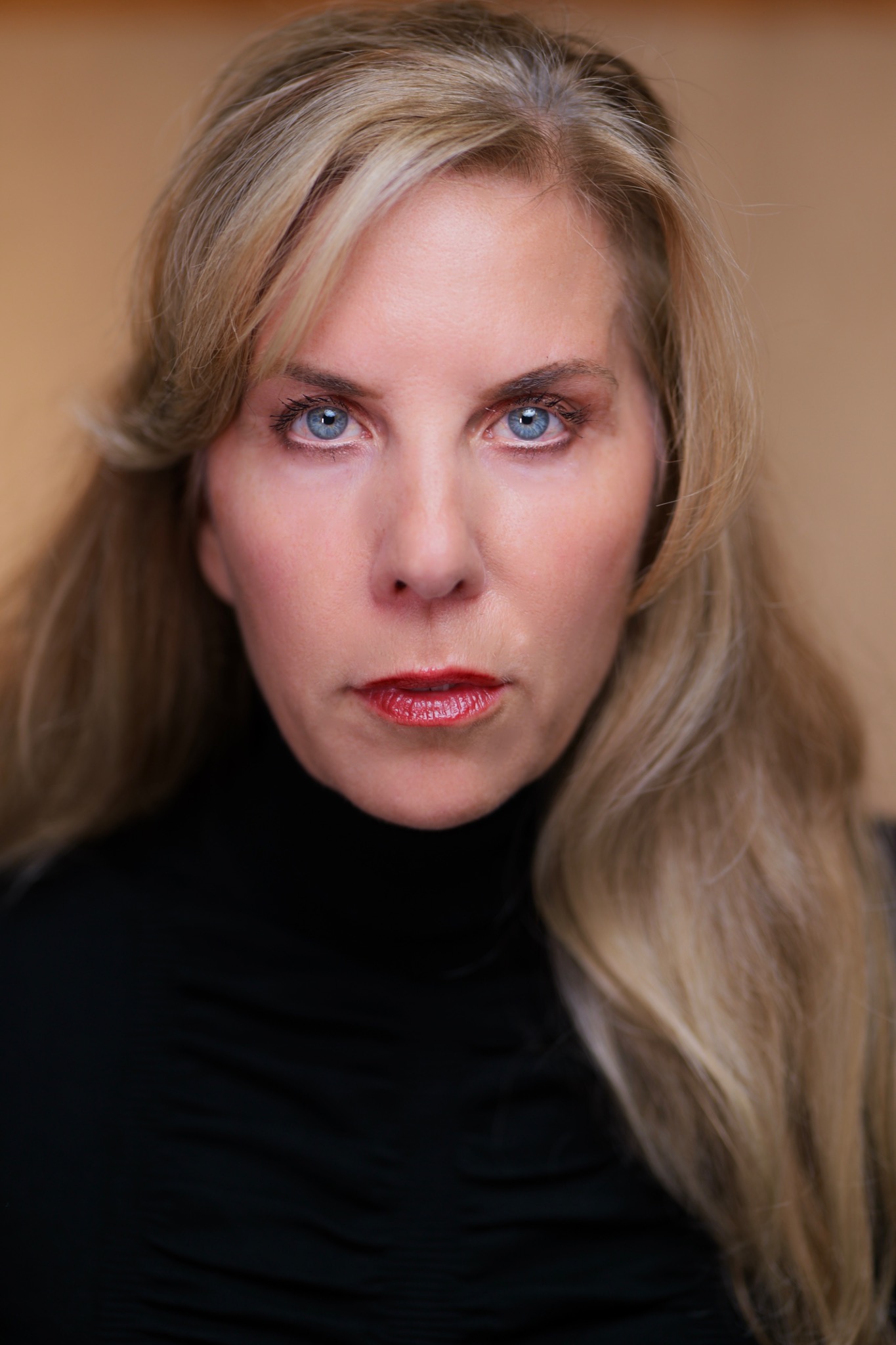 Professional headshot of Gina Ann